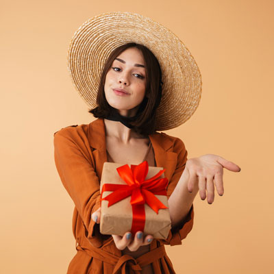 A woman holding a gift