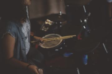 A drummer with their drum set